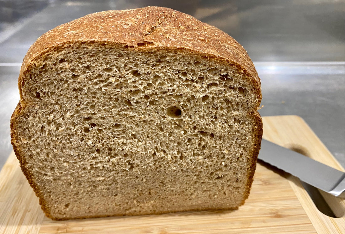 Large wheat loaf of bread baked at home